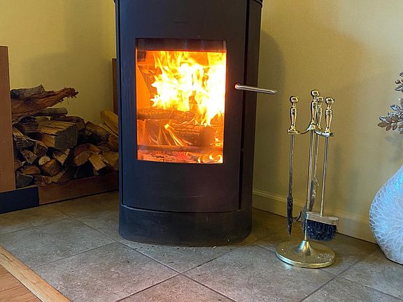Living room wood burning fireplace