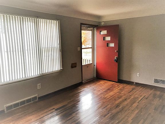 Freshly painted interior with hardwood floors throughout main floor.
