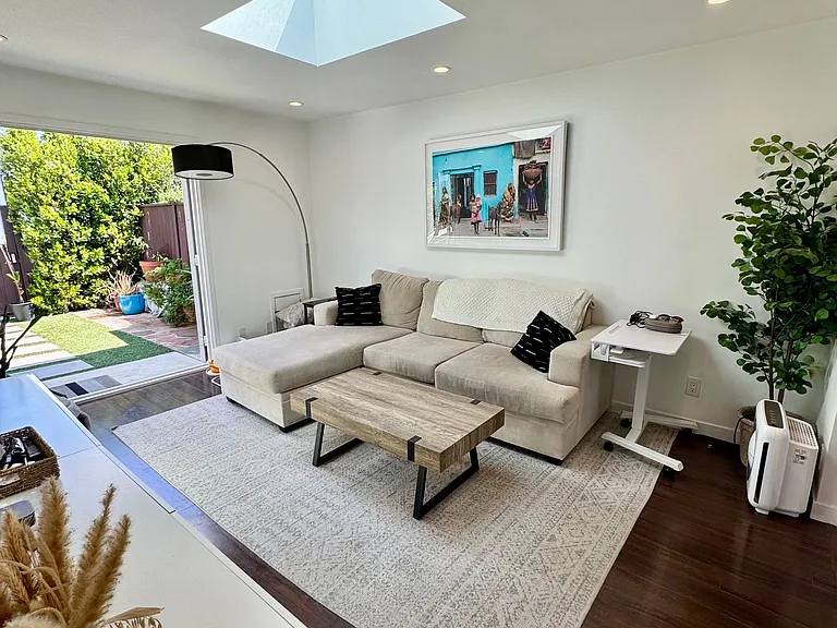 Living/great room example with older floors. We installed new lighter floors as seen in other pics