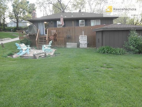 Large deck with storage below. Nice storage shed and lower patio