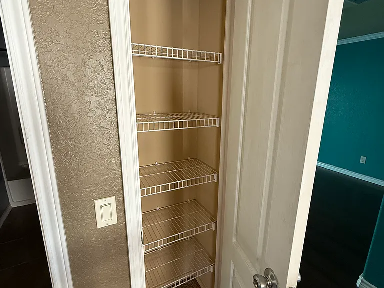 Storage cabinet located by the full upstairs bathroom where you can put towels, items and supplies