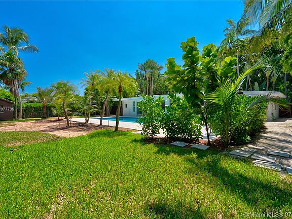 Privacy offered by Oversize 12,000 SF fenced, landscaped lot with large 18' x 36' pool (depth 3 to 6 ') 