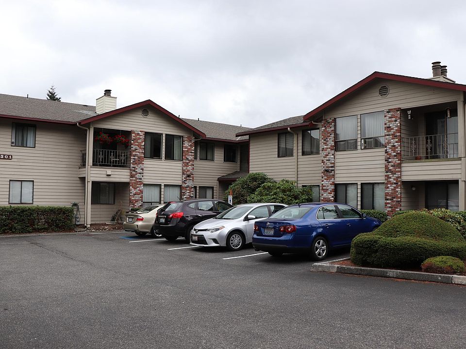 Front entrance with 8 parking spots and 1 disabled parking spot