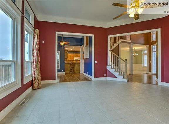 19x20 living room with high ceiling and great natural light.