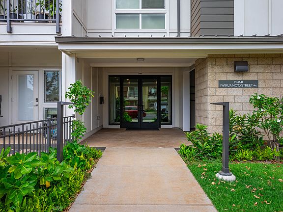 Building main entrance from the front with key FOB entry and callbox.