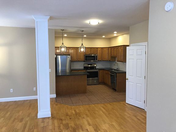 Living area looking into kitchen
