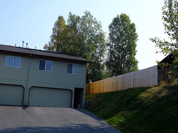 Front view with driveway