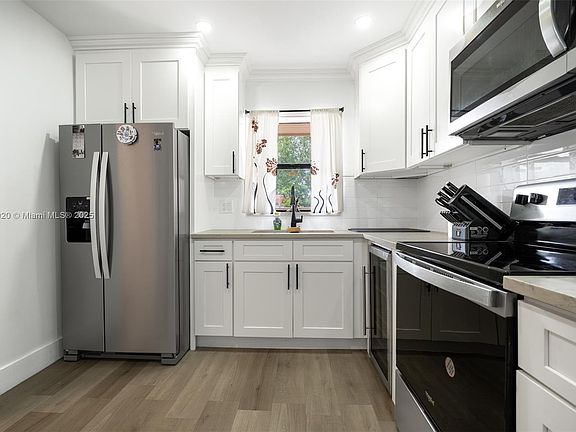 4th image of 11009 Royal Palm Blvd #2