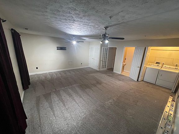 Den/Basement w/ 1/2 Bath