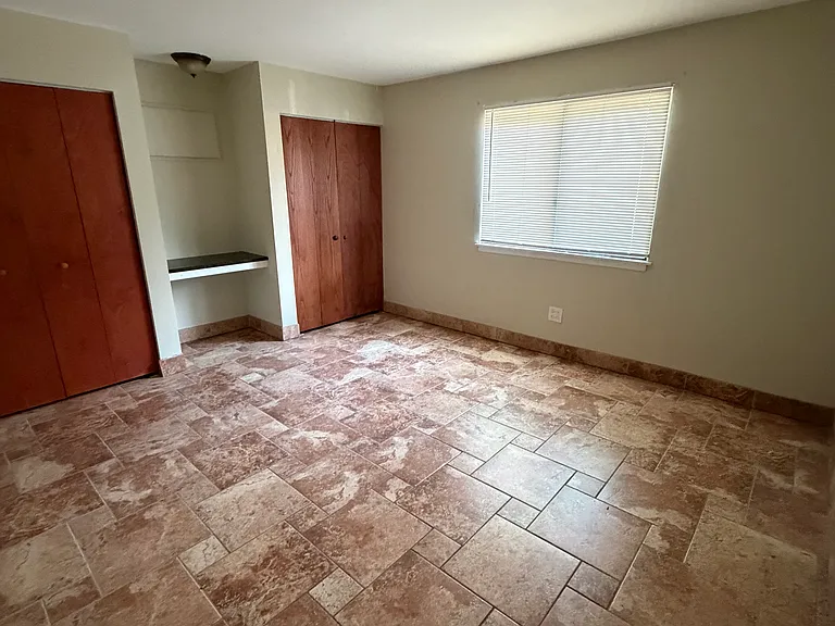 8469 Archer Ave #104 — Photo 6