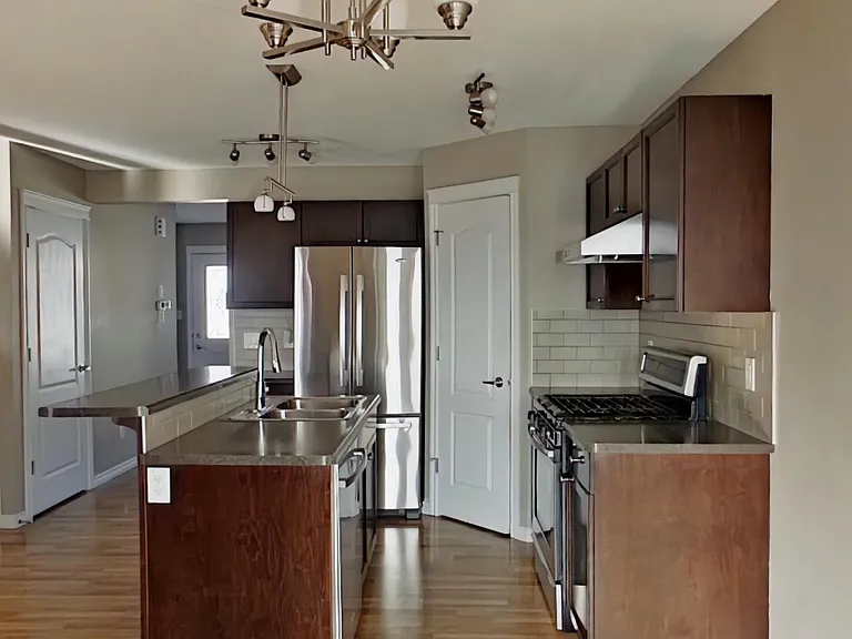 7665 Schmid Cres NW — Photo 1