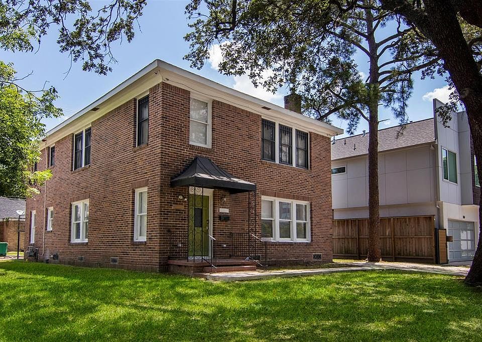 Front yard with Unit 1 off-street parking on the left (downstairs unit)