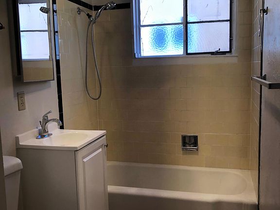 bathroom , complete with heat lamp
