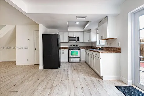 7920 Kimberly Blvd #305 Photo 1
