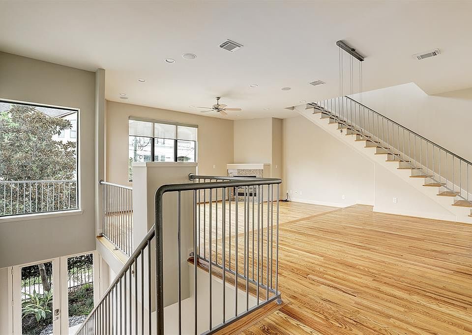 Soft contemporary home in the heart of Rice Military features great open concept living floorplan, amazing 2nd and 3rd floor views, three spacious bedrooms with ensuite baths and double car driveway.