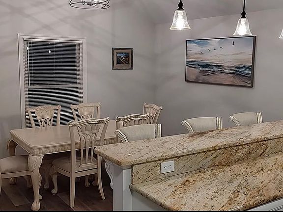 Dining Room and Bar Open To Kitchen