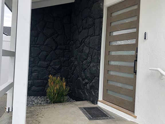 Entryway to house. We will be tiling steps and flat area..