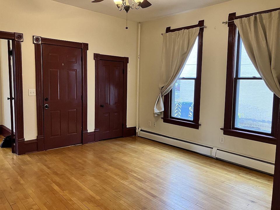 Living Room showing front entry and coat closet