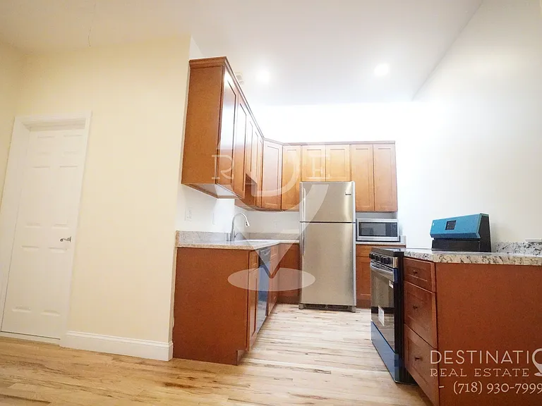 84-14 Pitkin Ave #2 — Photo 11