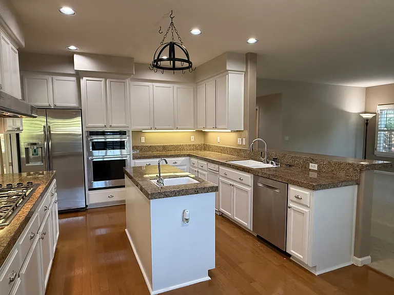 Kitchen is adjacent to the family room