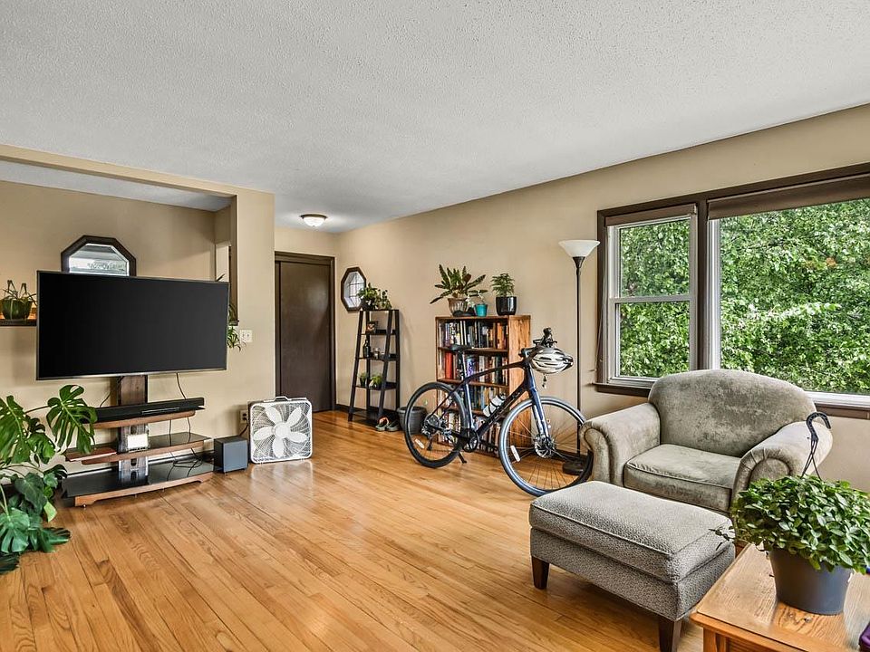 The lovely living room. Look at those massive windows!