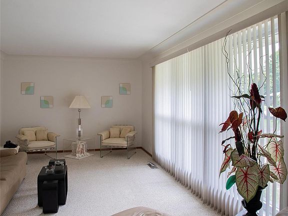 The wall of windows is perfect for letting in natural light as well as looking out over your landscaping.