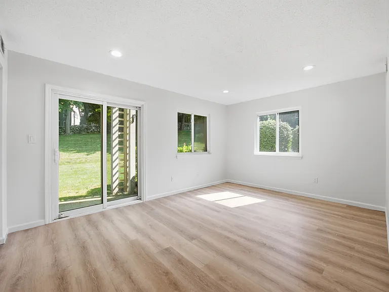 Primary bedroom. sliding door to patio