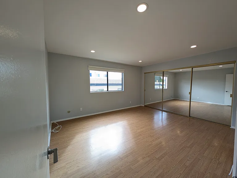 Master bedroom with new blackout blinds and recessed lightings