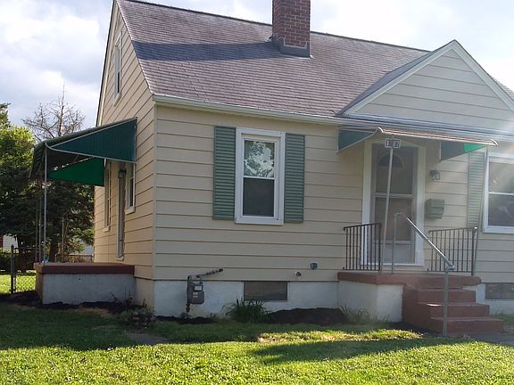 Exterior fenced in yard in front and back