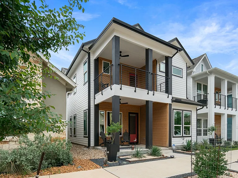 2 outdoor living areas on the front side of the home.
