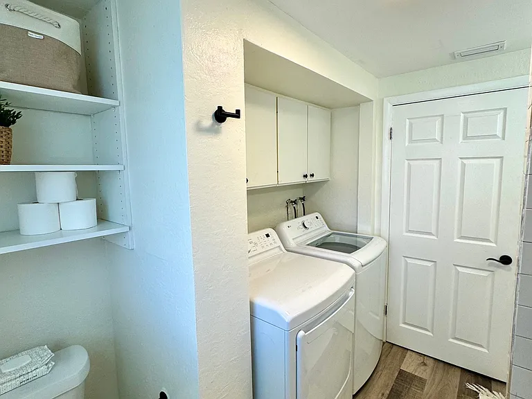 Bathroom, with laundry in unit