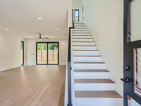 Open floor plan with the living room and kitchen downstairs.