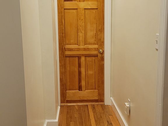hallway to bedrooms and 1st floor bath
