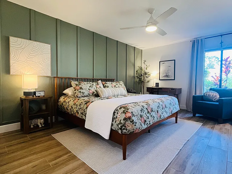 Primary Bedroom. King-size bed pictured.