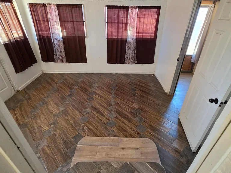 Bonus room access through kitchen. Door to backyard on the left. Bonus room #2 to the right