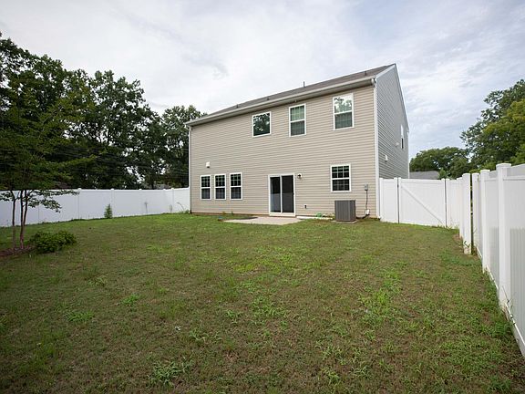 Flat backyard with privacy fence