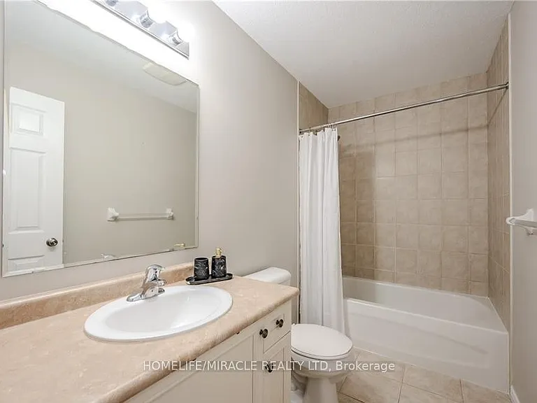 312 Tagge Cres — Photo 10