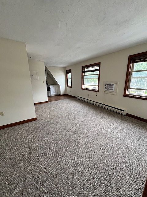 Living room facing towards kitchen