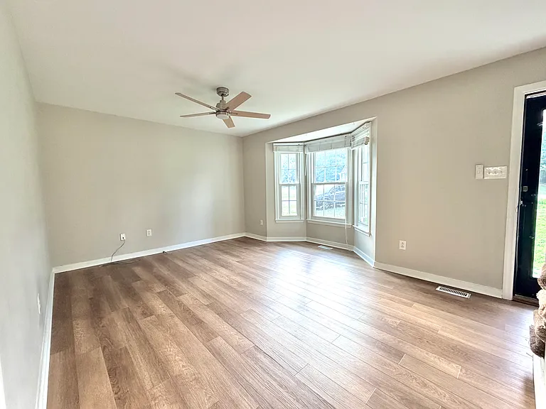 Spacious Front Living Room (with New Ceiling Fan & LVP Flooring)