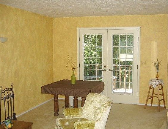 Living Room Opens to Shady Deck