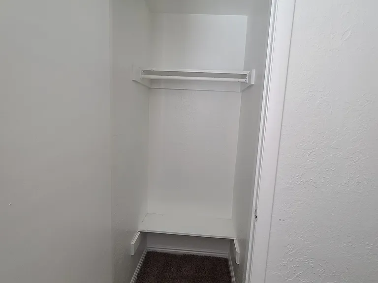 Deep closet in bedroom