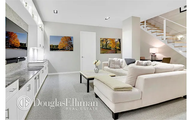 Sold by Douglas Elliman | media 13