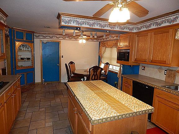 Lovely kitchen with lots of prep space and large island.
