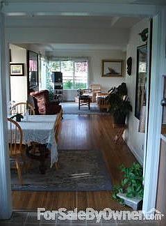 Living Area
						:
						photo taken from kitchen looking southwest into dining and living area