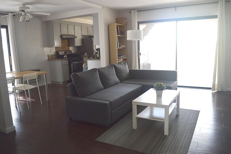 Open living room, dining, and kitchen area