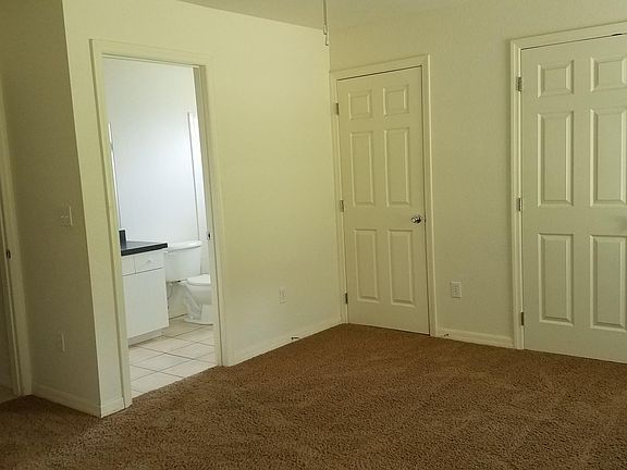Master bedroom with two closets and bath.