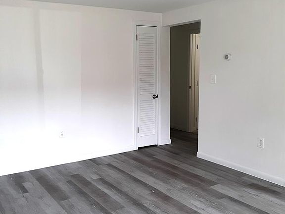 Living room through to bathroom & bedroom