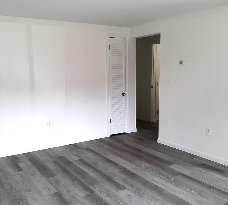 Living room through to bathroom & bedroom