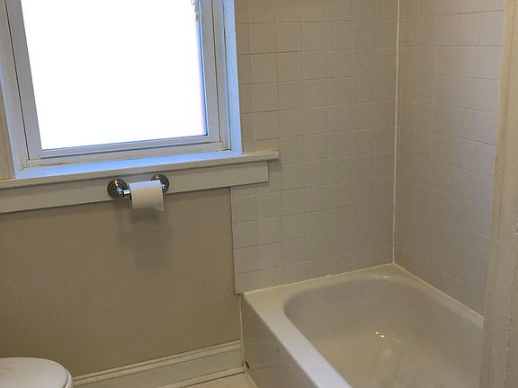 White tile with black accent.