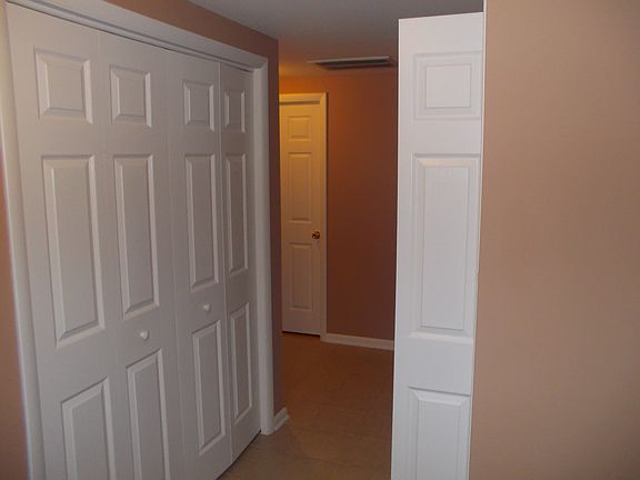 hall to 3 of 4 bedrooms 
